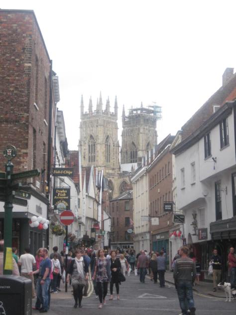 The towers of York Minster loom above Low Petersgate